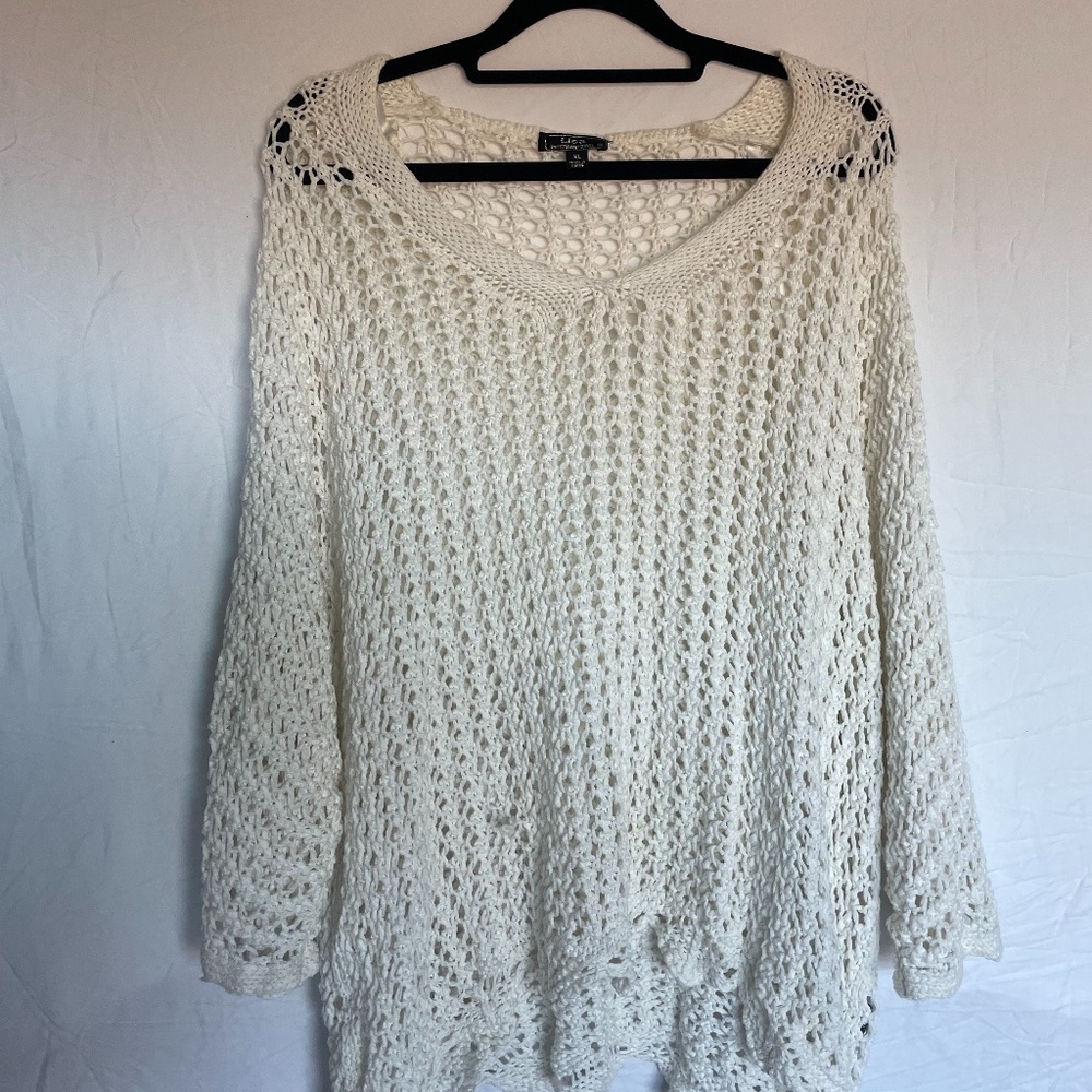 White "holey" sweater
